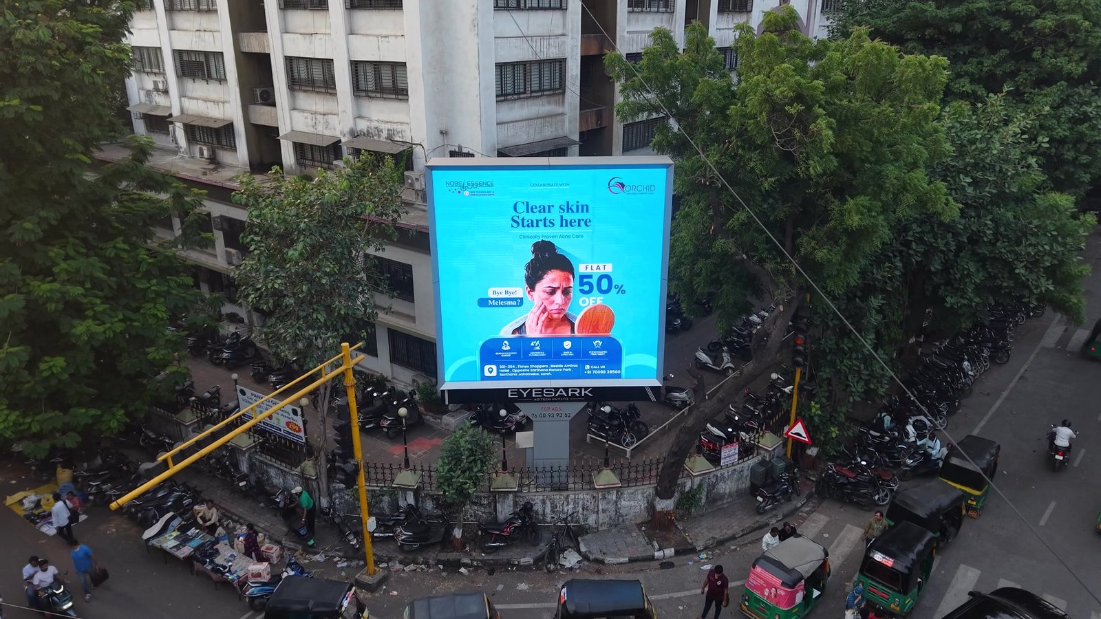 Real outdoor LED advertising at a busy Surat junction
